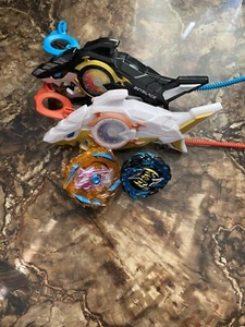 Beyblade Haiwerfer mit Reißleine und Bayblade Konvolut - Bild 1 von 2