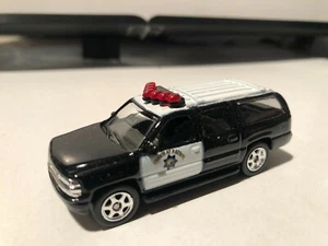 1/60 WELLY 2001 CHEVROLET SUBARBAN CALIFORIA HIGHWAY PATROL BLACK AND WHITE - Picture 1 of 7