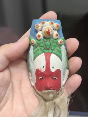 El "脸谱面具模型" de la cerámica del patrimonio cultural antiguo e inmaterial chino Foto 1 de 4