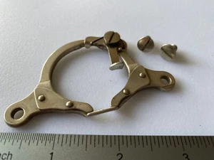 Parte macchina da cucire "F" modello casa nuova - chiusura bobina, gruppo espulsore - Foto 1 di 3