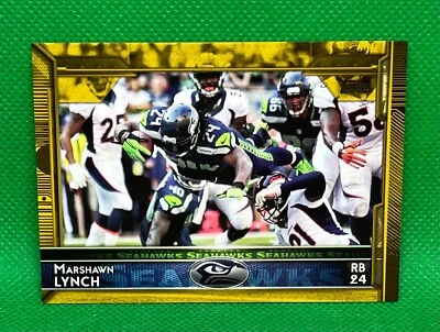 2015 TOPPS MARSHAWN LYNCH GOLD PARALLEL 640/2015 #206 SEAHAWKS - Image 1 of 2