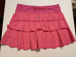 Falda de tenis de rendimiento Lululemon rosa caliente con volantes talla 6 alta Usada en excelente condición - Imagen 1 de 9
