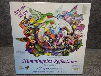 Rompecabezas SunsOut forma especial 600 piezas colibrí reflejos por Lori Schory Foto 1 de 3