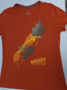 Camiseta NIKE Dri-Fit WHEATIES Gráficos Naranja - Unisex/Hombre Talla L - Usada en Excelente Condición - Imagen 1 de 7