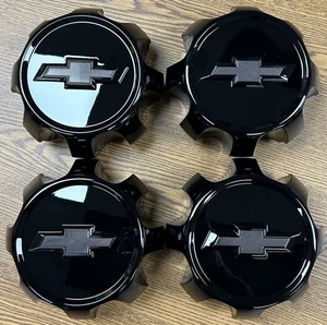 7" Chevrolet Silverado 2500, 3500 Gloss Black OEM Center Cap 23378307 Set - Picture 1 of 2