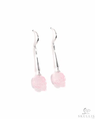  Pendientes de calavera de cristal tallado a mano de cuarzo rosa, joyería de calavera Foto 1 de 3