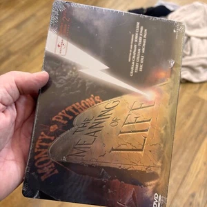RARE MONTY PYTHON - MEANING OF LIFE STEELBOOK BRAND NEW AND SEALED - Bild 1 von 6
