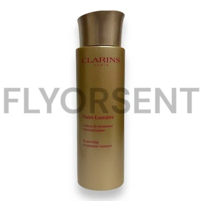 CLARINS Nutri-Lumiere Renewing Treatment Essence 6.7oz UNSEALED / NEVER USED - Image 1 of 2