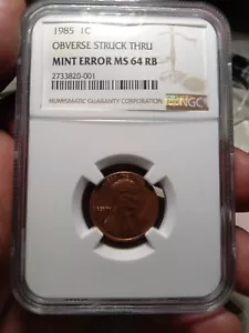 1985 1c OBVERSE STRUCK THRU MS 64 NGC - Picture 1 of 3