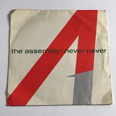 The Assembly - Never Never 7" Vinyl Record - 7 tiny 1 - Image 1 of 4
