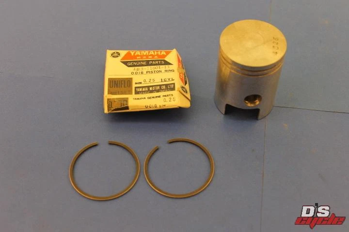 NOS Yamaha AS1 AS2C Piston 183-11635-03 And Ring Set 183-11-11601-11 (1ST O/S) - Image 1 of 4
