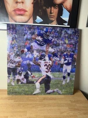ARTE DE PAREDE PLEXIGLASS SAQUON BARKLEY HURDLE AMOS JR. - NEW YORK GIANTS - 23" X 23" - Imagem 1 de 3