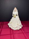 ROYAL DOULTON THE BRIDE (IVORY) BY DOUGLAS V. TOOTLE HN3285 W/Yellow Roses