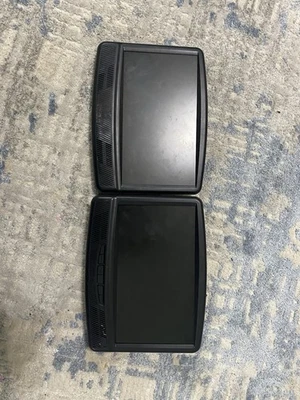 Juegos dobles de reproductor de DVD portátil RCA Foto 1 de 4