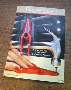 Red Nail Holder Finger Saver New Sealed - Picture 1 of 1