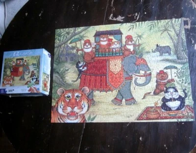 Rompecabezas Linda Jane Smith Cómic y gatos curiosos jinetes de elefantes India 2010 Foto 1 de 3