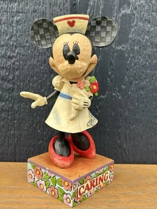 Jim Shore Disney Minnie Mouse Krankenschwester 8" Figur Pflege ist ansteckend 4007665 - Bild 1 von 13