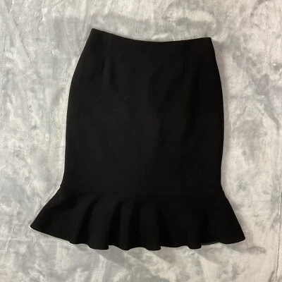 Falda midi de lana negra Escada talla 36 para mujer con cremallera y botones en la espalda Foto 1 de 4