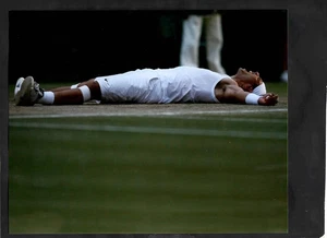 Rafael Nadal 8" x 10" Glossy Film Photo Poster Lying Down Winner - Picture 1 of 3