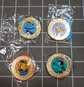 Disney Wonderball Coins Lot of 4 - Picture 1 of 5