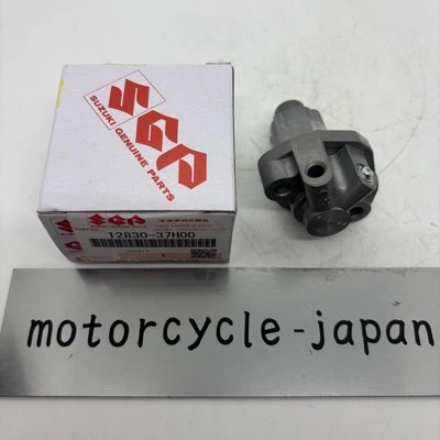 SUZUKI Genuine GSX-S750/R600/R750 Tensioner Adjuster Assy 12830-37H00-000 - Imagen 1 de 4