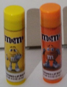 2 M&M Taste Beauty Lip Balms, 1 ORANGE & 1 YELLOW M&M Flavored Lip Balm Sealed - Picture 1 of 1