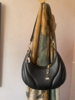 Black Y2K minimalist French Parisian crescent bag hard shell with gold charms - Image 1 of 4