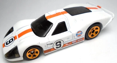 2022 HOT WHEELS '67 FORD GT40 MK. IV #9 GULF WHITE 3" DIECAST RACE CAR W/ ORANGE - Image 1 of 4