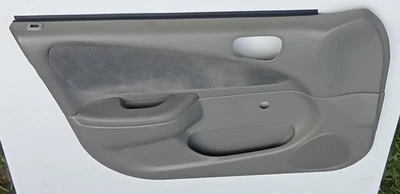 Panel puerta delantera izquierda Toyota Corolla 1998 1999 2000 2001 2002 manual Foto 1 de 4