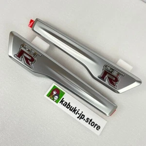 NISSAN GENUINE 63871-62B0A 63870-62B0A GTR R35 Front Fender Emblem R & L Set OEM - Picture 1 of 12