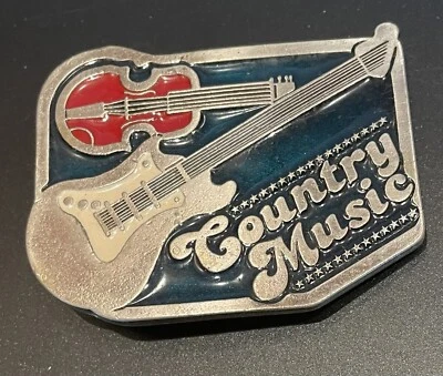 Violín y guitarra vintage de música country de los años 70 con hebilla de cinturón de peltre esmaltado Foto 1 de 2