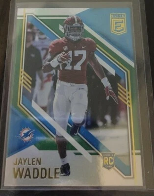 Dolphins Clipping & Card lot w/ 2021 Jaylen Waddle Elite Rookie Jason Taylor Tua - Image 1 of 4