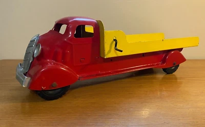 Camión de plataforma plana de juguete de acero prensado Marx Studebaker DA-78 Foto 1 de 4