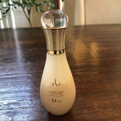 J'adore-Christian Díor Womens BEAUTIFYING BODY MILK 75ml 50% Full - Image 1 of 2