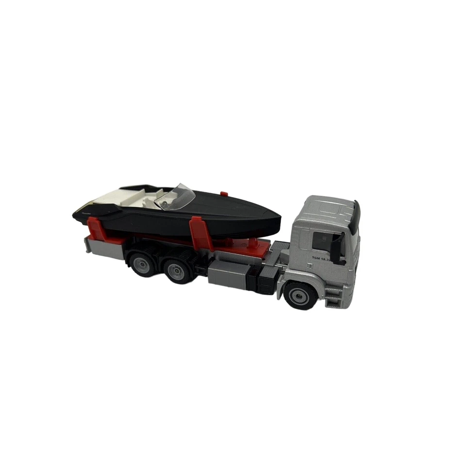 SIKU TGM 18.320 Man MK S211 Truck With Boat - Image 1 of 4