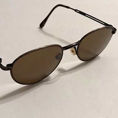 Gafas de sol vintage Guess marrón metal marco color bronce ovalado utilería tamaño adulto Foto 1 de 4