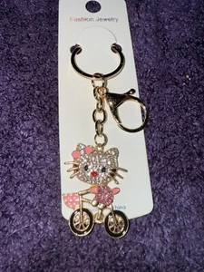 Pink Rhinestone Hello Kitty In Bicycle - Picture 1 of 5