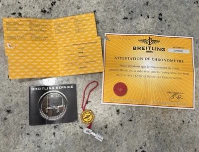 Breitling A1335653 Chronomat Papers: Certificate Service Book And Hang Tag - Image 1 of 4