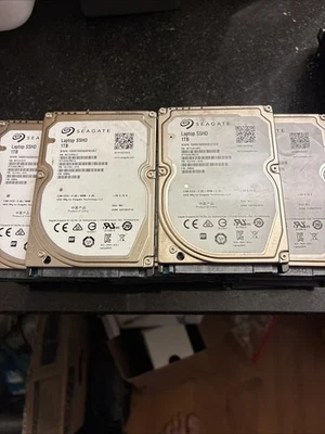 Unidad híbrida Sata sólida Seagate Laptop SSHD 1 TB ST1000LM014 8 GB NAND Flash 2,5" Foto 1 de 4