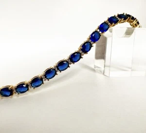 Pulsera de tenis con acabado en oro amarillo ovalado azul zafiro y diamantes creados regalo - Imagen 1 de 6