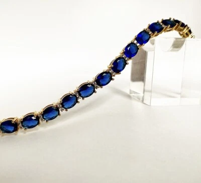 Yellow gold finish oval Blue sapphire and created diamonds tennis bracelet gift - Image 1 of 4