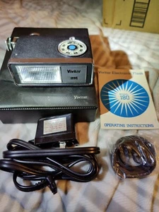 Vivitar 180 Electronic Flash with Case and Manual and Charging Cord - Picture 1 of 7