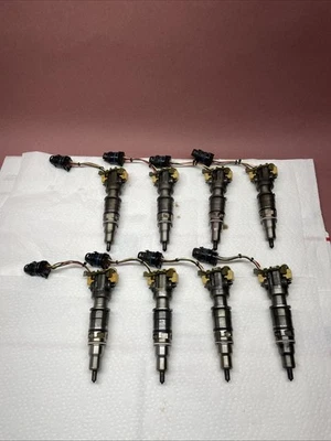 03-07 Ford F250 F350 6.0 6.0L Diesel Fuel Injector Set (8) Injectors *Cores* - Image 1 of 4