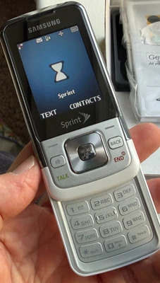 Celular Samsung M330 Slide SPHM330ZWS Sprint - Imagem 1 de 4