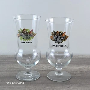Two Rainforest Cafe Hurricane Souvenir Glasses/cups - Orlando and Nashville (2) - Imagen 1 de 5