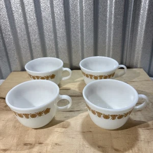 Menge 4 - Corning Pyrex Schmetterling Gold Milchglas Kaffeetassen - Bild 1 von 5