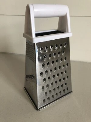 Rallador de alimentos de metal plateado para cocina de 4 lados cortador de queso vegetal trituradora Foto 1 de 2