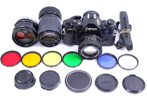 Canon A-1 Film Camera FD NFD 50/1.4 35-135mm 28mm f2.8 Lenses Works Fine Ship - Picture 1 of 23