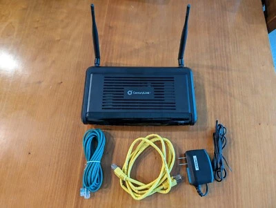 Módem/router inalámbrico CenturyLink Actiontec C1900A DSL de 4 puertos con cables y alimentación Foto 1 de 2