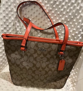 100% Coach Signature Leder Canvas Beuteltasche Tasche Orange - Bild 1 von 9